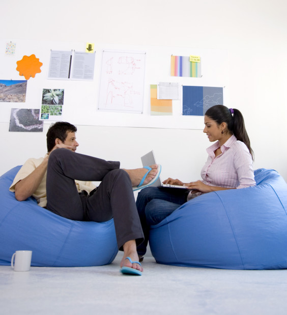 Man and a Woman Having a Casual Meeting on Beanbags