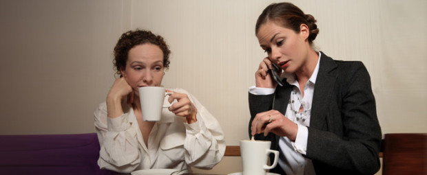 Business Woman Having drink with Another Woman