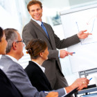 Businessman Presenting a Graph in a Meeting