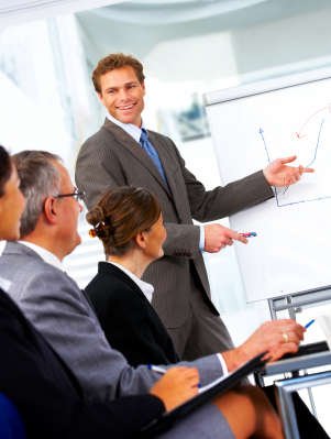 Businessman Presenting a Graph in a Meeting