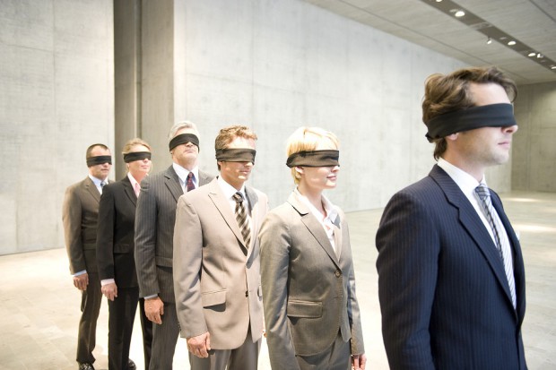 A Line of Business People Blindfolded